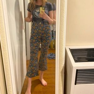 Minga sunflower print kick flare jeans